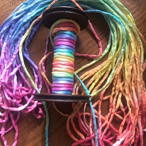 Silk ribbon and string, hand dyed in rainbow colours