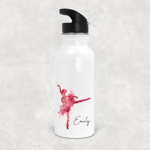 May include: White water bottle with a pink watercolour ballerina design and the name "Emily" printed on the side. The bottle has a black lid with a flip top and a straw.