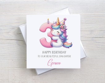 May include: A pink and white unicorn with a rainbow mane and tail is hugging a pink number 3 with a lit candle on top. The card says "Happy Birthday to our beautiful daughter Grace".