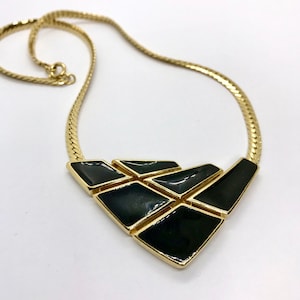 Black and gold metal bib necklace signed Trifari Vintage Costume modernistic choker wide flat chain style necklace