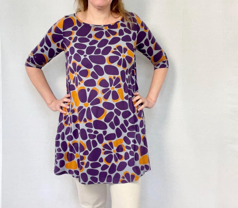 Marimekko dress ade from soft stretch fabric, this dress is perfect for casual outings or layering. The 3/4 sleeves and timeless design make it a versatile piece for any wardrobe