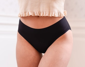Culotte de règles ultra-fine et ultra-absorbante par Loulou - culotte menstruelle - tanga - flux léger