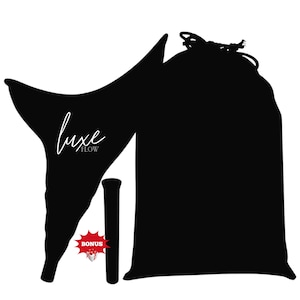 May include: Black reusable menstrual cup, drawstring storage bag, and a cylindrical applicator. The words "luxe flow" are written in white script. A red "bonus" tag is visible.