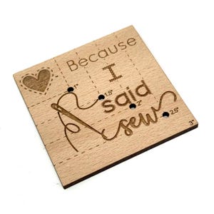 May include: A wooden sewing project board with the text "Because I said sew" and a needle and thread design. The board has markings for 1, 1.5, 2, 2.5, and 3 inches.