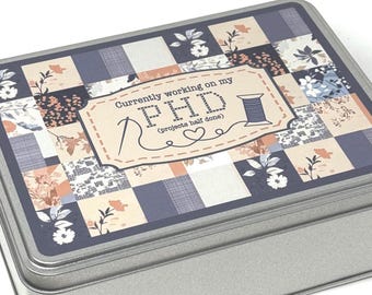 PHD Bobbin storage tin with foam insert to hold 30 bobbins for cross stitch / embroidery projects