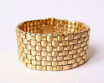 Paillasson bracelet in 18K yellow gold with square braided links