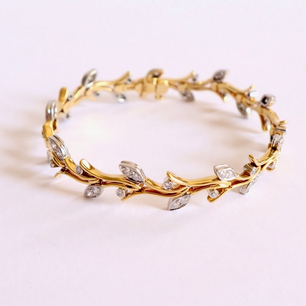 TIFFANY’S Bracelet en or jaune 18k platine et diamants feuilles