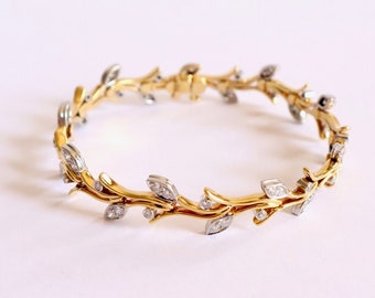 TIFFANY’S 18 Karat Gelbgold-Platin- und Diamantblatt-Armband