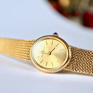 BAUME ET MERCIER Women's wristwatch circa 1960 in 18 kt yellow gold