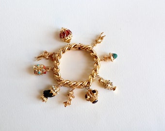 Vintage 18 carat yellow gold charm bracelet circa 1960