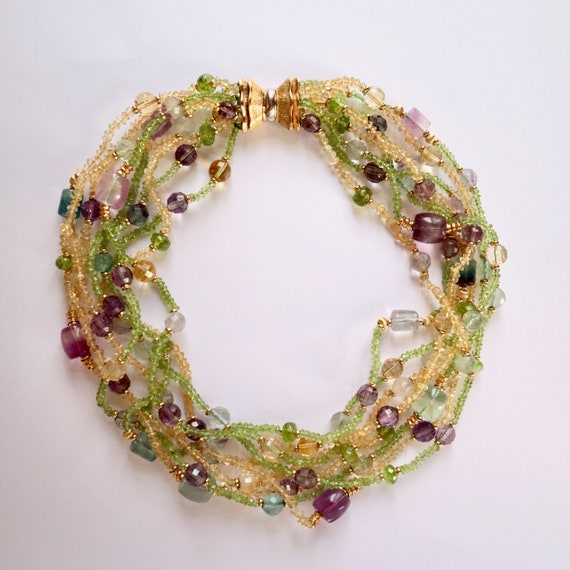 Collier huit rangs en or jaune 18 kt composé d’am… - image 1