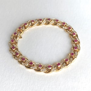 Cartier Curb-Gliederarmband aus 18 Karat Gelbgold mit Rubindiamanten im Vintage-Stil Bild 9
