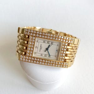 Reloj CHAUMET de oro de 18 quilates y diamantes para mujer Modelo de estilo