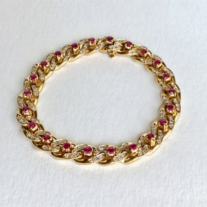Cartier Curb-Gliederarmband aus 18 Karat Gelbgold mit Rubindiamanten im Vintage-Stil Bild 3
