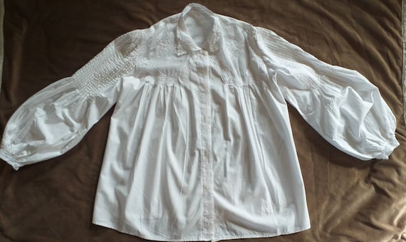 White blouse with lace inserts