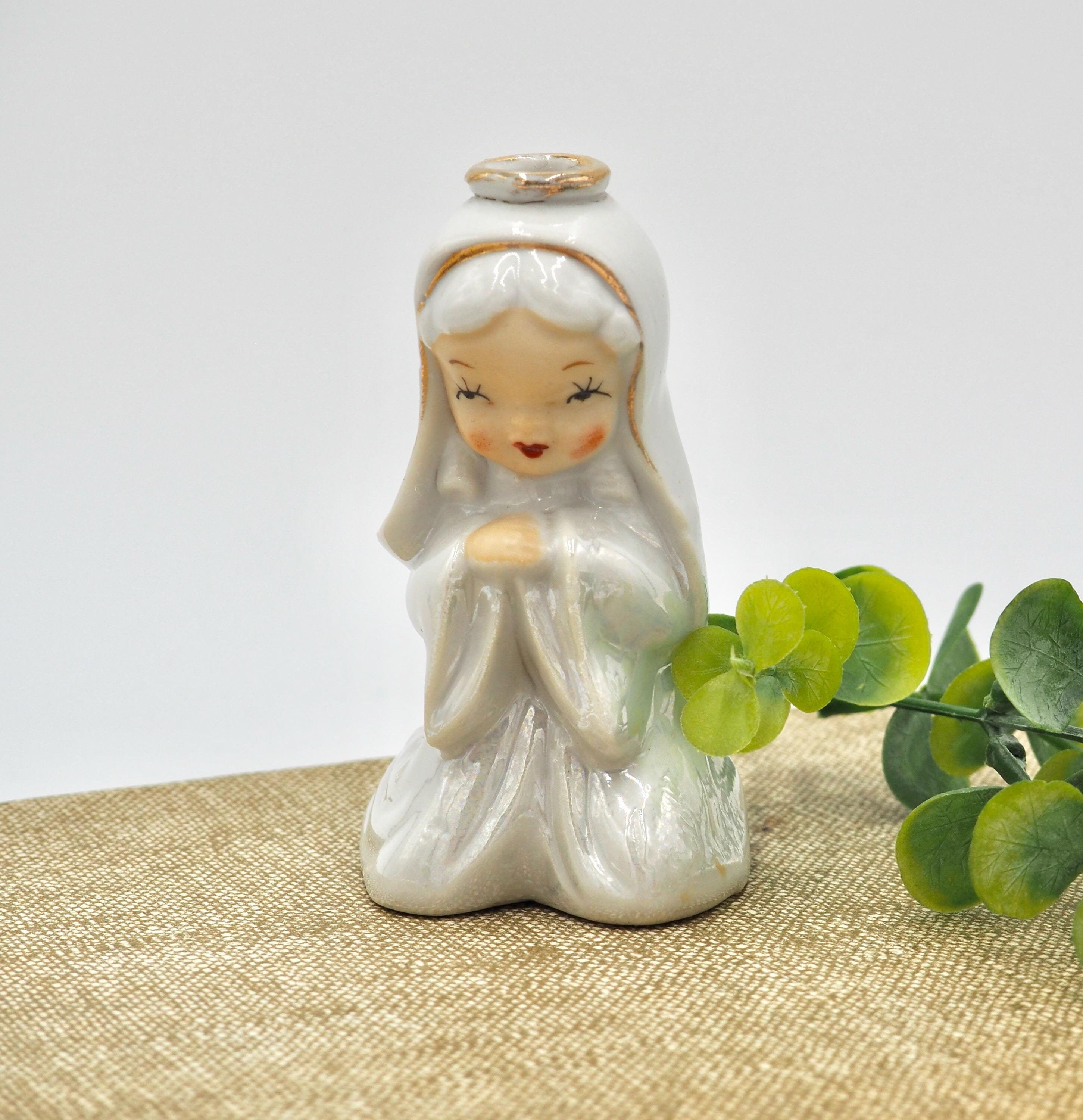 cigarettes ice cream figurines of the virgin mary Kitsch Nun