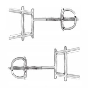 May include: A pair of silver-toned metal earring settings featuring a four-prong basket design for holding a gemstone. Each setting includes a threaded post and a matching screw-back closure, providing a secure mechanism for fastening the earring.