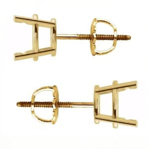 May include: A pair of gold stud earring settings featuring a four-prong basket design for holding a gemstone. Each setting includes a threaded post and a matching screw-back closure, providing a secure fit for the earring components.