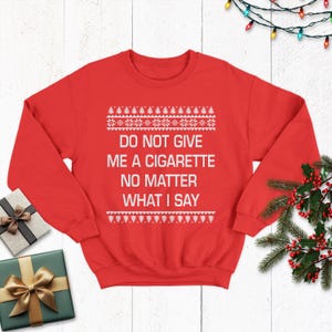 do not give me a cigarette christmas sweater Funny Ugly Xmas Party shirt Thats not cheating right Ugly Christmas Cigs Crewneck Sweatshirt