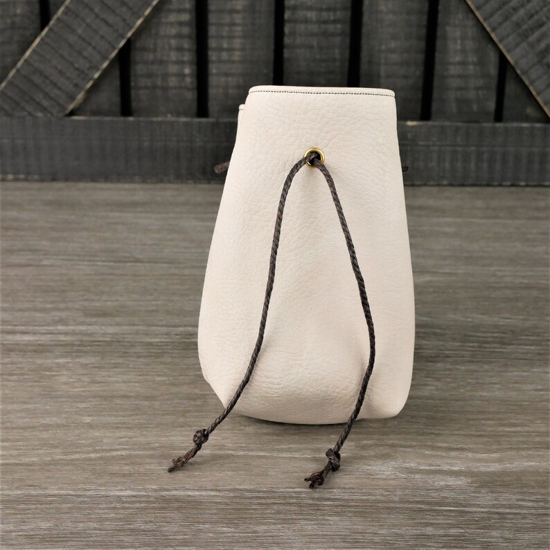 small white drawstring bags