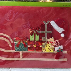 Weihnachtszeit - Geschenk gefüllte Schlitten Papyrus Grußkarte (eine)