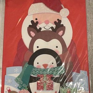 Temporada navideña: Papá Noel, pingüino y oso con regalos desplegables - Tarjeta de felicitación Papyrus (una) Nueva