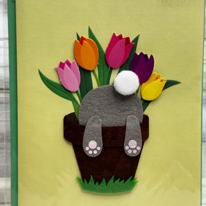 Ostern - süßes Häschen im Blumentopf voller Tulpen Papyrus Grußkarte