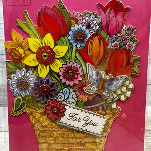 Pâques - Carte de vœux avec panier de fleurs printanières par Papyrus (ONE)