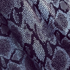 Cuir de serpent tridimensionnel noir et blanc