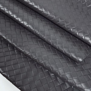 Cuero de textura premium en relieve Dakar trenzado de hierro forjado