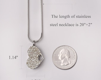 May include: A silver heart-shaped pendant necklace with a fingerprint design. The pendant is 1.14 inches tall and 0.71 inches wide. The necklace is 22 inches long.