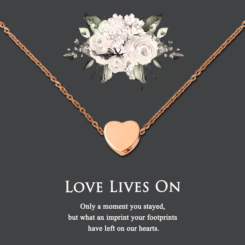 Puede incluir: Un collar de coraz&oacute;n de oro con una cadena delicada. El collar est&aacute; sobre un fondo gris con un dise&ntilde;o floral. El texto "LOVE LIVES ON" est&aacute; debajo del collar, seguido de la cita "Only a moment you stayed, but what an imprint your footprints have left on our hearts."