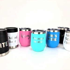 May include: Set of eight stainless steel tumblers with various colors and personalized text. The tumblers feature names, phrases like "This might be wine" and "Dad's Wine", and "Best Mom Ever".
