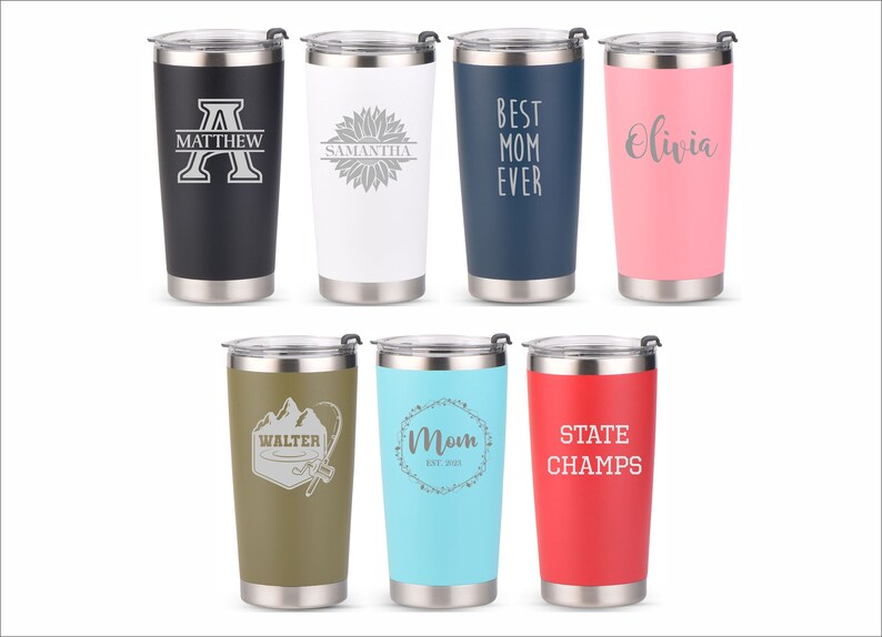 May include: Eight stainless steel tumblers with various designs and colors. The tumblers feature personalized text and graphics, including a sunflower, a mountain range, a fishing rod, and the words "Best Mom Ever".