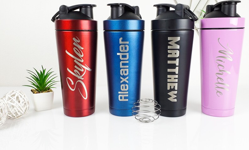 May include: Four stainless steel shaker bottles with personalized names: Skyler, Alexander, Matthew, and Michelle. The bottles are red, blue, black, and pink.