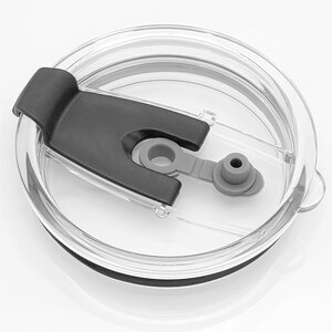 May include: A clear plastic lid with a black silicone ring and a black slider. The lid has a small gray silicone spout.