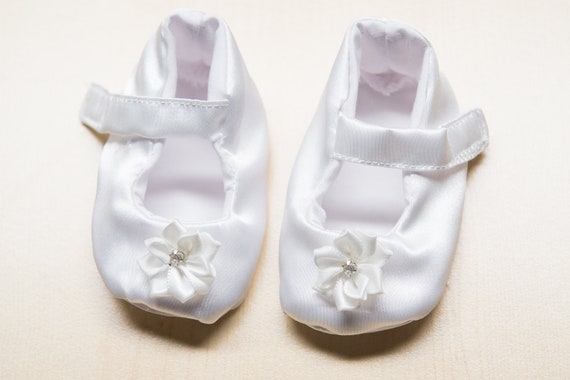 white satin baby shoes
