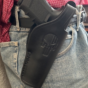 Kabura skórzana Thumb Break z wytłoczonym motywem czaszki, pasuje do Glock 17 / 22