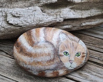 Cat painted on stone