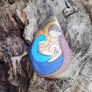 Stone painted "Holy Family"