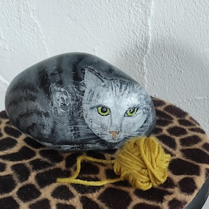 Cat painted on stone