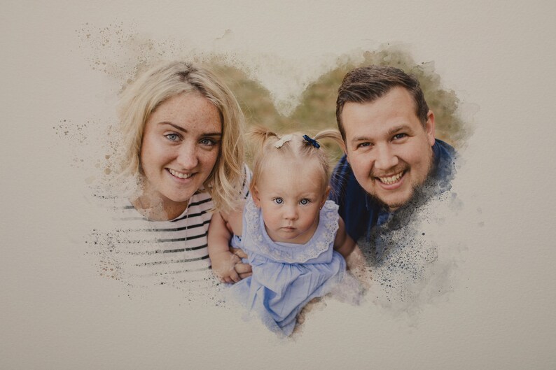 May include: A watercolor painting of a family with a mother, father, and a young child. The family is smiling and looking at the camera. The painting is in a heart shape.