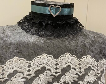 Stunning fetish collar, black ribbon and lace choker with Green ribbon and heart diamanté pendant and tied with ribbon and D rings