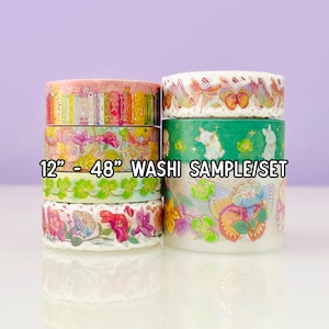 May include: A stack of six washi tape rolls with various floral, butterfly, and bunny designs. The rolls are in shades of pink, green, and white. Text on the image reads "12" - 48" WASHI SAMPLE/SET."