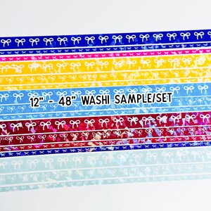 May include: A set of 12 washi tape samples, each featuring a different color and pattern of white bows on a glittery background. The tapes are 12 inches long and 48 inches wide.