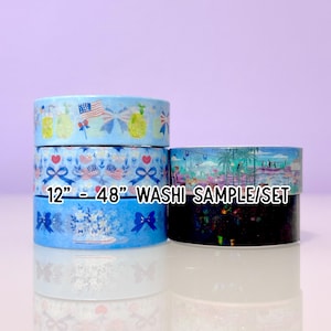 May include: A stack of washi tape rolls with various designs. The rolls feature patterns including pineapples, flags, bows, and floral arrangements. The text "12" - 48" WASHi SAMPLE/SET" is printed on the tape.