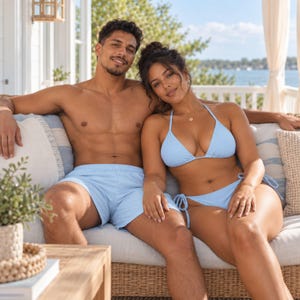 May include: A light blue two-piece bikini with triangle cups and side-tie bottoms, paired with light blue swim trunks featuring an elastic waistband. The swimwear set is a solid, uniform pastel blue colour, designed for swimming and water activities.
