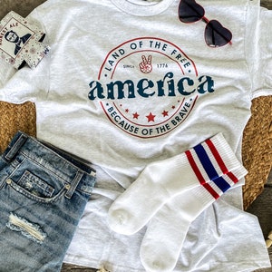 4th of July Tee or Sweatshirt - Land of the Free because of the Brave - Patriotic Tee - America Rocks Tee - Fireworks Tee