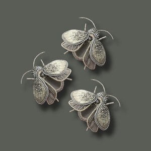 Please note! The price is for one brooch.