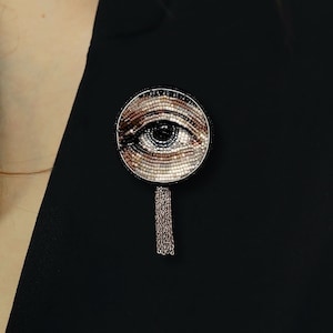 Broche mauvais oeil perles épingle Daith bijoux sorcière sombre milieu universitaire mauvais oeil collier pendentif gothique bijoux broderie épingle bonne chance cadeaux